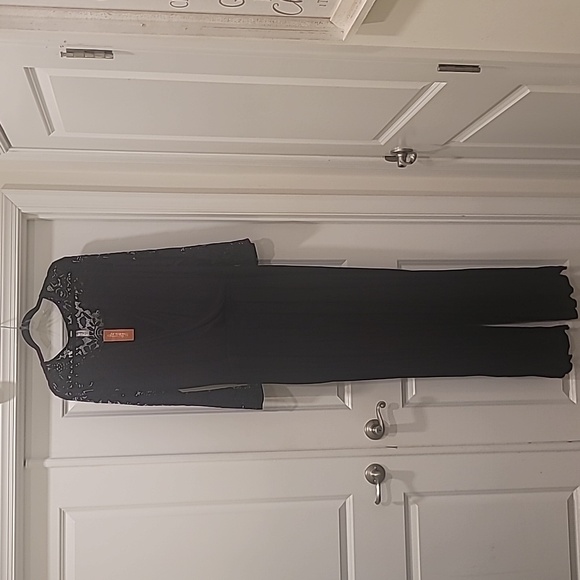 American Rag Pants - Black stretchy 95% Rayon 5% spandex Jumpsuit with Lace